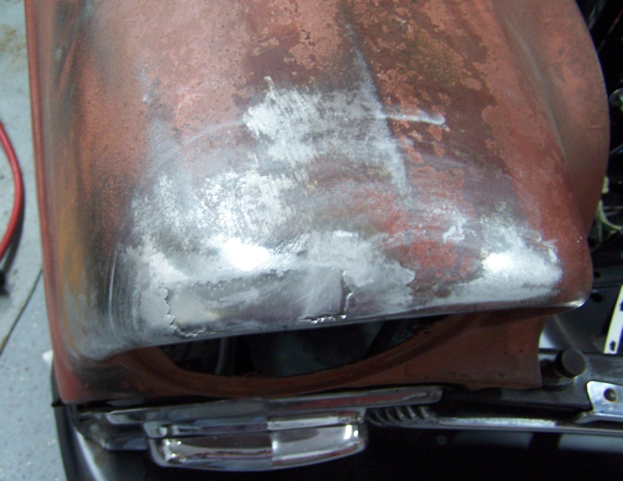 New metal in passenger fender