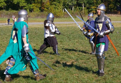 Squire Matthew waits on Squire Riochard to be ready to fight.