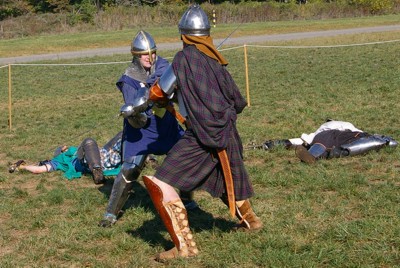 Sir Michael fights Angus Frasier among the fallen knights.